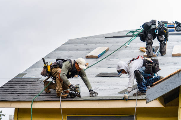 Professional Roof Replacement technician working in Rutherford, NJ
